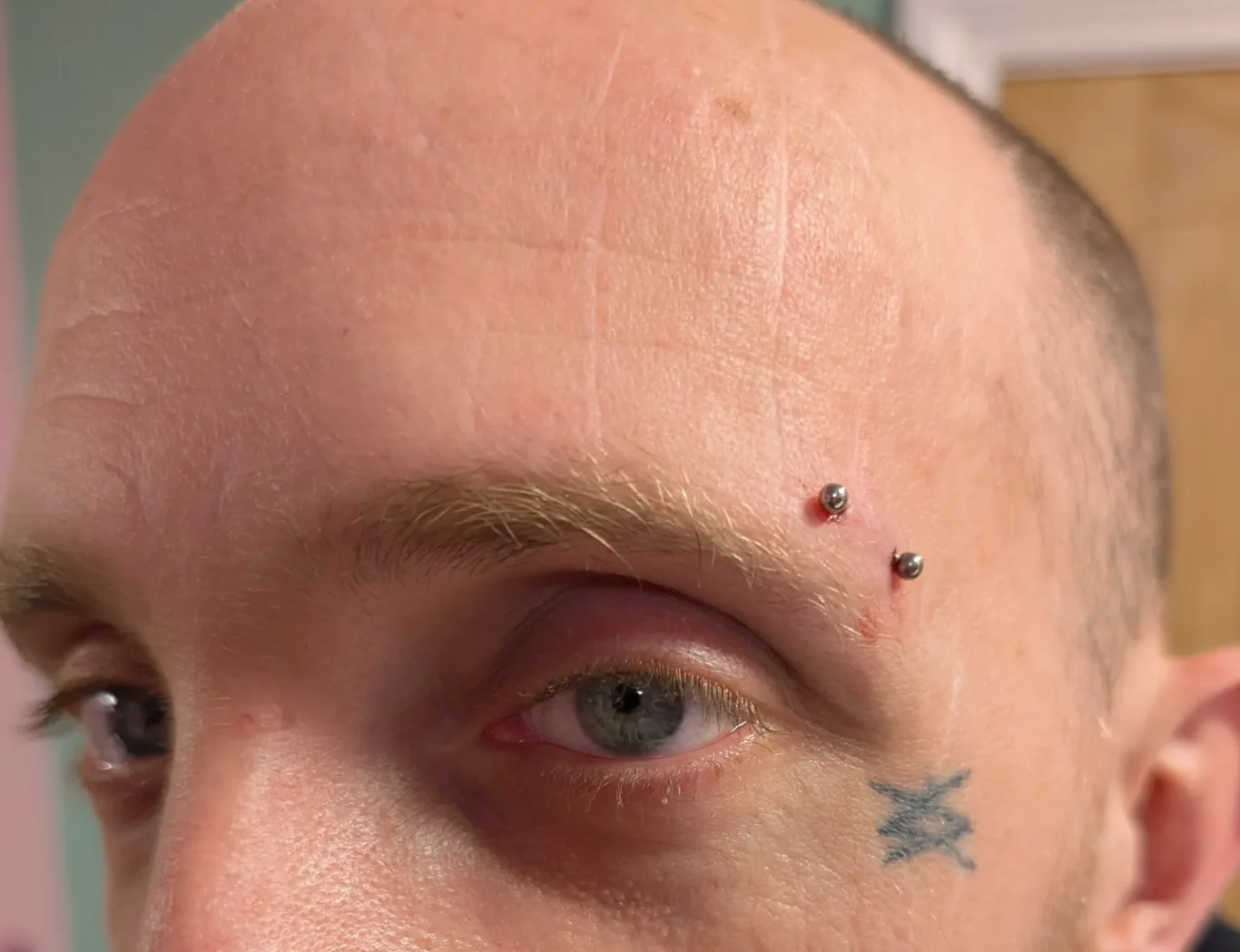 Horizontal Eyebrow Piercing
